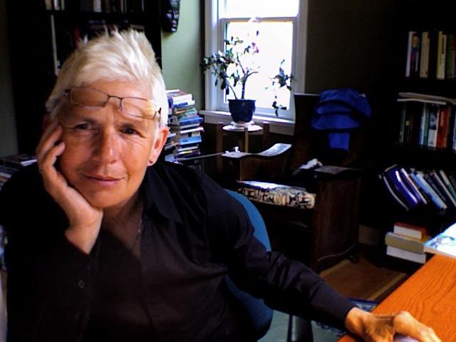 Jodey Castricano at their desk